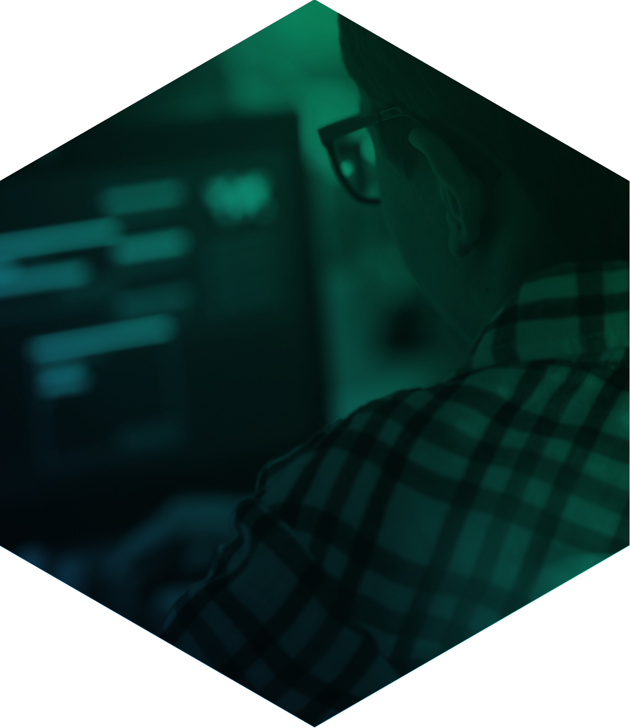 Student working on computer seen through green filter