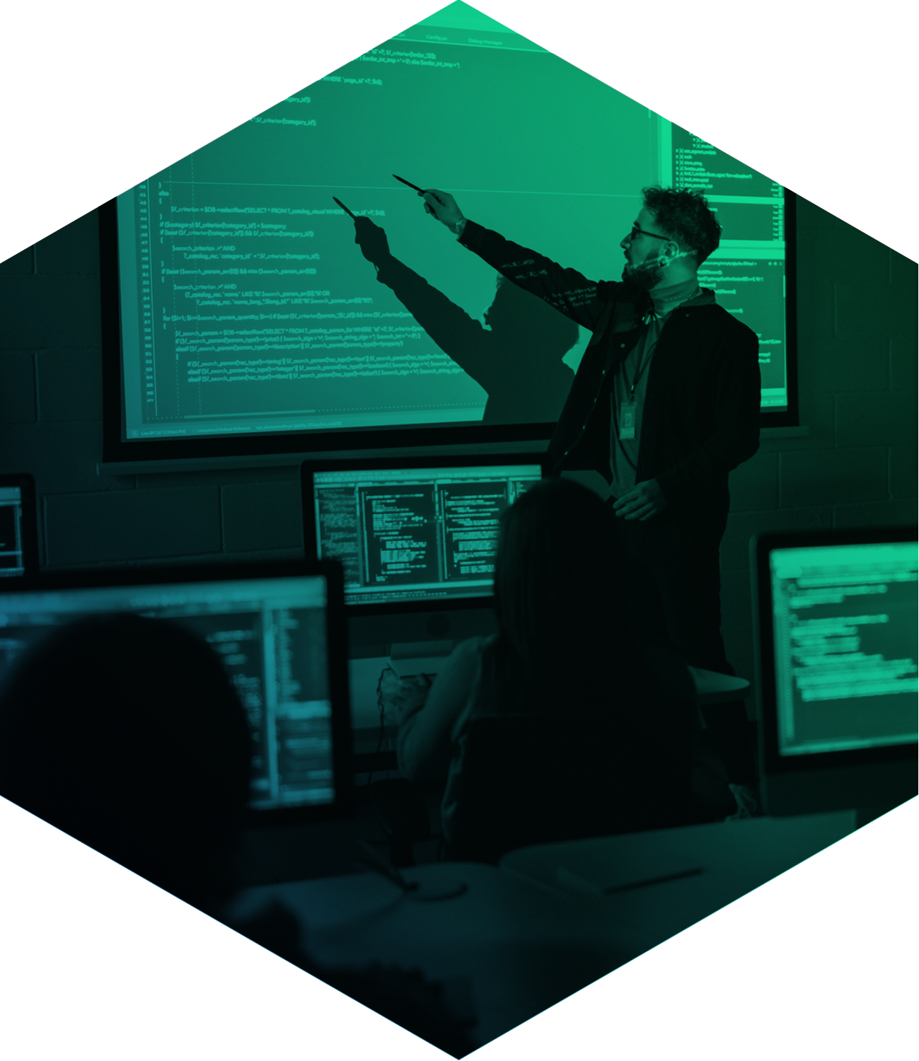 Teacher presenting about computer code seen through green filter