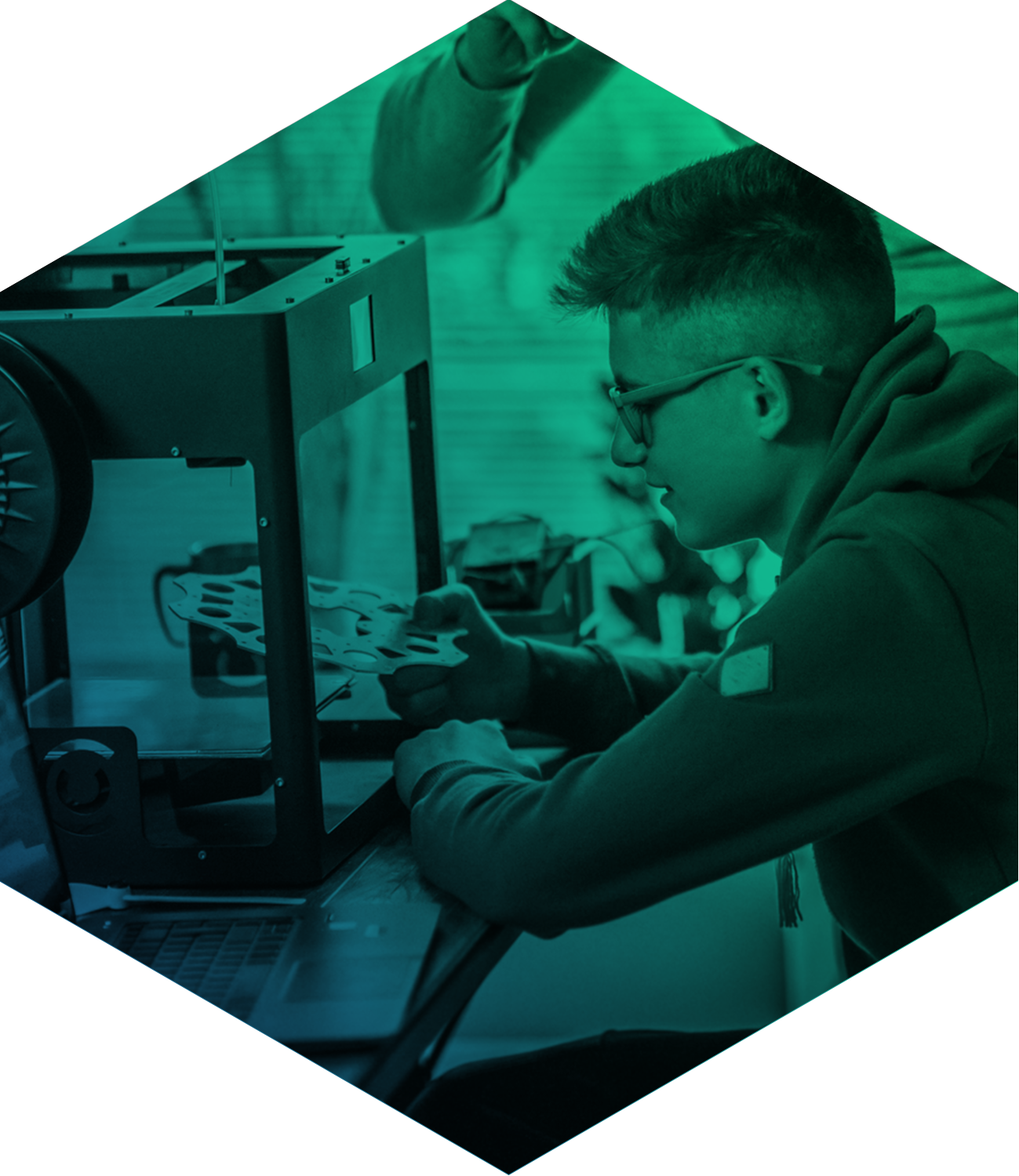 Student looking at a gear seen through green filter