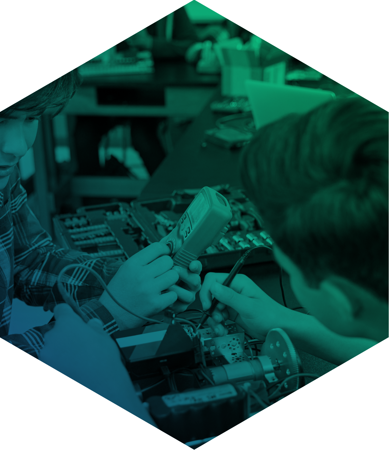 Students testing electrical circuits seen through a green filter